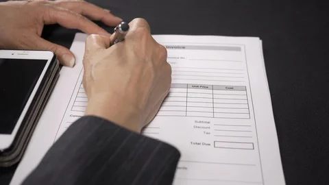 Wedding store manager creating an invoice for a client 4k. Stock Footage 96019731