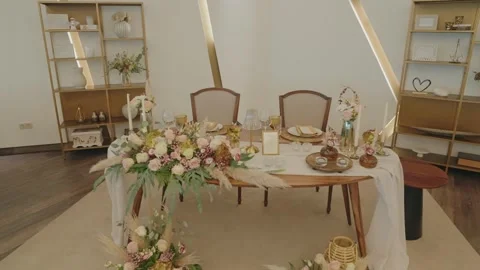 Wedding Sweetheart Table with Floral Runner Inside Boho Tipi Tent Venue Stock Footage 332948828