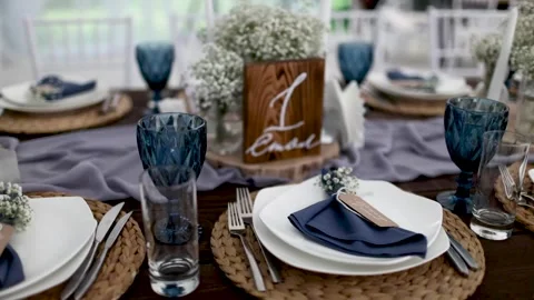 The wedding table is beautifully decorated with elements in blue. Stock Footage 131936393