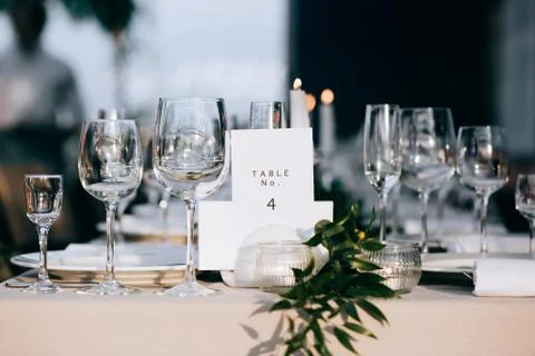 Wedding table decor. Card with table number Stock Photos