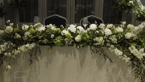 Wedding table decor with fresh flowers, camera movement Stock Footage 306148074