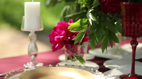Wedding table decor at the nature with candles, close-up. Steadicam shot Stock Footage 50975837