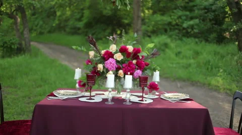 Wedding table decor at nature on a sunny day. Steadicam shot Stock Footage 51342838