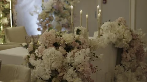 Wedding Table Decorated with Flowers and Candles Stock-Footage 300476444