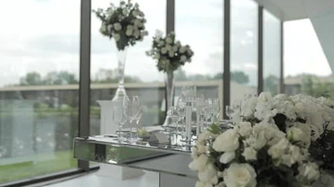 Wedding Table Decorated with Flowers and Candles Stock Footage 300488491