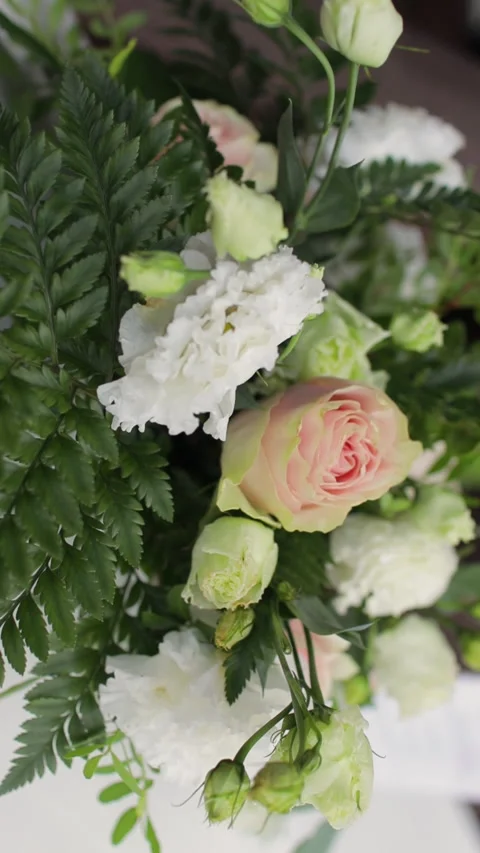 Wedding table decorated with flowers, close-up. Vertical video. Stock Footage 271127860