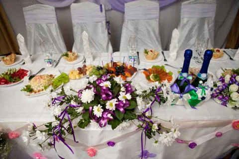 Wedding table decorated with flowers Stock Photos