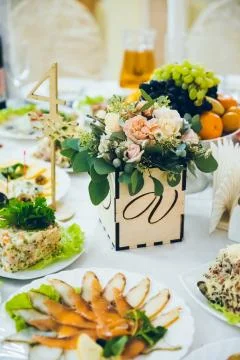 Wedding table decorated with flowers Stock Photos