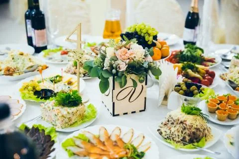 Wedding table decorated with flowers Stock Photos