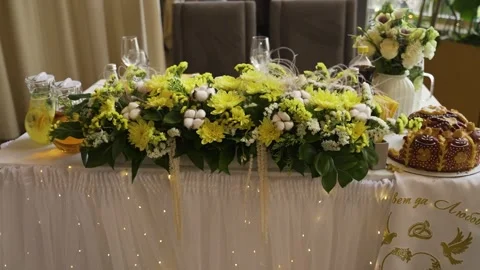 Wedding table decorated with yellow flowers Stock Footage 314341953