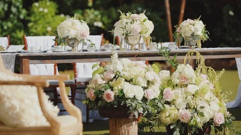 Wedding table decoration with charming flowers outdoors of resort hyatt,island Stock Footage 101119016