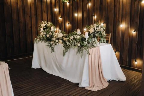 Wedding table decoration with flowers on the table in the castle, table decor 스톡 사진