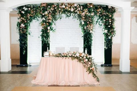 Wedding table decoration with flowers on the table in the restaurant table de Stock Photos