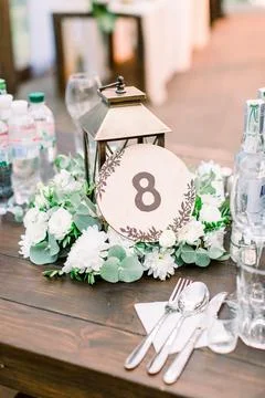 Wedding table number and decor in rustic style. wedding decorations for table in Stock Photos