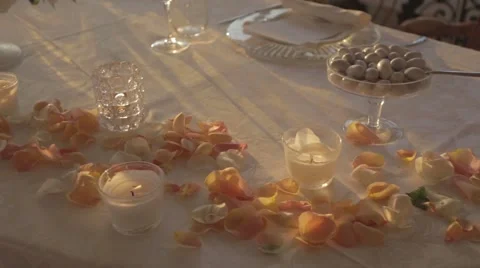 Wedding table petals candles dolly shot Video stock 43104938