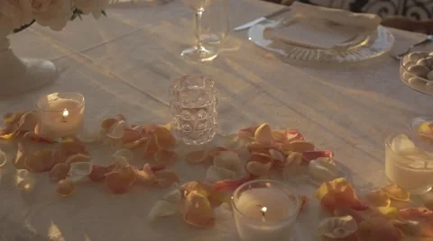 Wedding table petals candles dolly shot Video stock 43106249