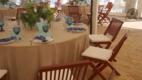 Wedding table serving with blue glasses and flowers. Stock-Footage 149777244