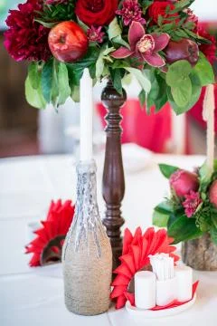 Wedding table set for fine dining or another catered event in red colors Stock Photos