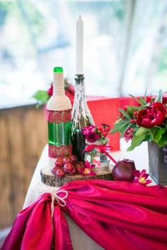 Wedding table set for fine dining or another catered event in red colors Stock Photos