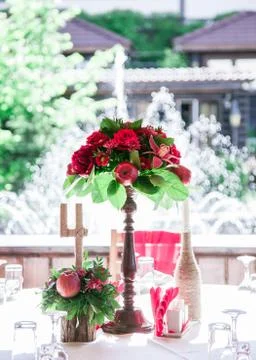 Wedding table set for fine dining or another catered event in red colors Stock Photos
