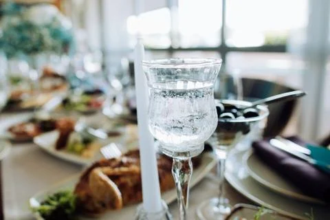 Wedding table setting. Candles and candlesticks on the table in a restaurant Stock Photos