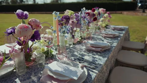 Wedding table setting with flowers and pink glassware close up Stock-Footage 347969034