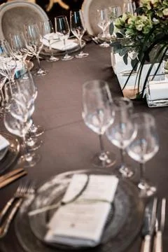 Wedding table setting. glasses in blur 스톡 사진