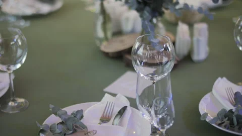 Wedding Table Setting with Green Tablecloth and Place Cards Stock Footage 313226920
