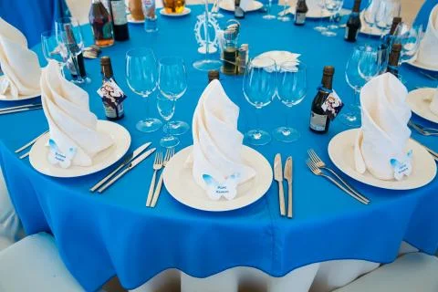 Wedding table setting up with plates and flowers 写真素材