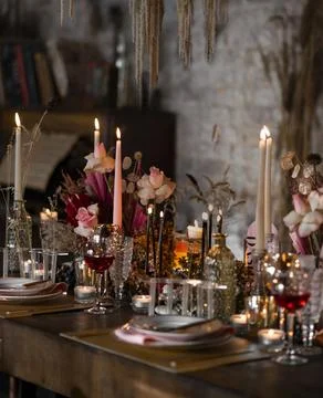 Wedding table setting in red pink and burgundy tones Stock Photos