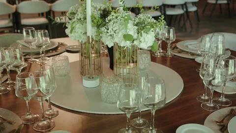 Wedding Table Setting With Wine Glasses and Flowers Stock Footage 340837373