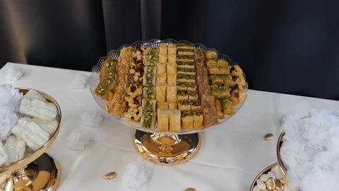 Wedding table with sweet and flowers Stock Footage 129315700