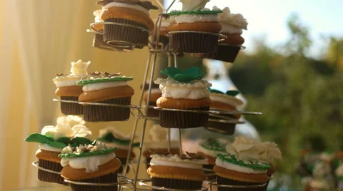 Wedding table with sweets and cakes, pastries sweets, tea table, candy bar Stock Footage 67644594