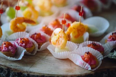 Wedding table with variable cute snacks. Wedding reception. Stock Photos