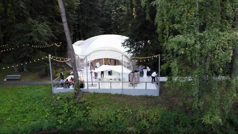 A wedding tent in a beautiful forest Stock Footage 118617839