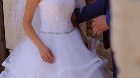 Wedding theme, holding hands newlyweds Video stock 65175331