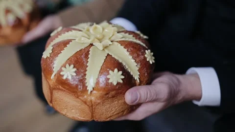 Wedding tradition man hold a loaf for meeting of newlyweds Stock Footage 132697170