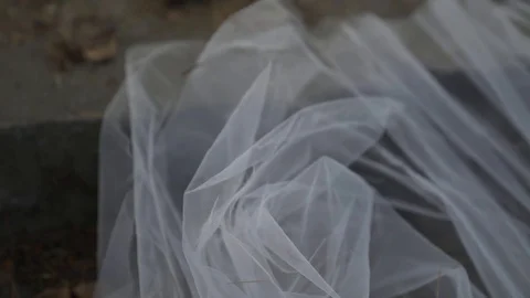 Wedding veil glides on old steps Stockbeeldmateriaal 115423198