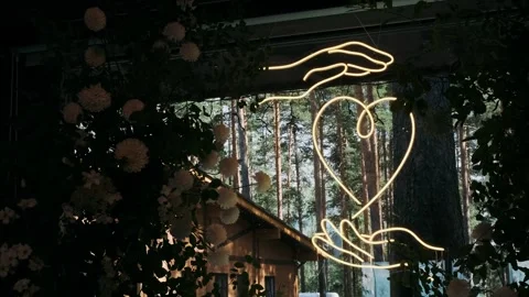 Wedding wedding decor with greenery and neon heart Stock Footage 271140901