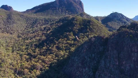 Wedge-Tailed Eagle Soaring Over Warrumbungle National Park Mountain Range Stock Footage 340966522