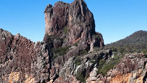 Wedge-Tailed Eagle Soaring Over The Breadknife Rock Formation in Australia Stock Footage 341905305