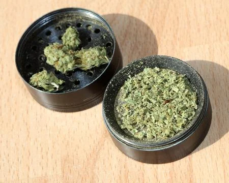 Weed black grinder close up macro medical marihuana instant stock photos im.. Stock Photos