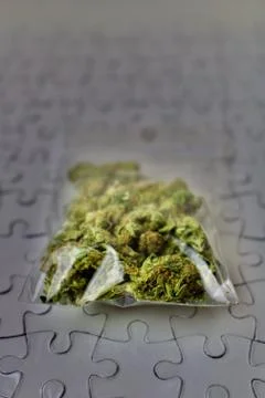 Weed on puzzles Stock Photos