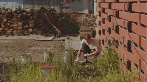 Weeding the ground, weeding the soil, clean the soil of weeds Stock Footage 336537256