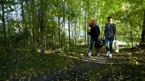 Weekend time. Couple go to BBQ party Stock Footage 81768753