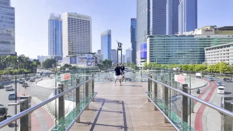 Weekend Walk When Jakarta Lights Up HI Roundabout from Java 動画素材 299714531