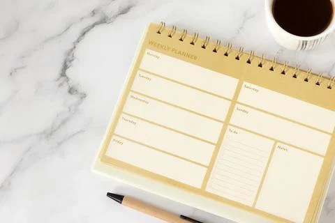 Weekly planner with daily notes and to do list blank page with coffee cup Stock Photos