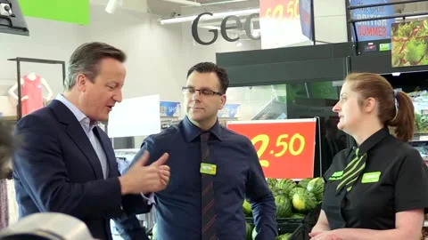 Weekly shop warning from David Cameron and Harriet Harman at Asda Stock Footage 149140793