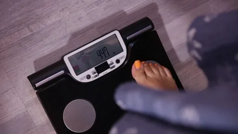 To weigh 1 Stock Footage 307415684