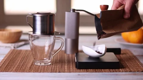 Weighing coffee beans for preparation of specialty coffee infusion footage Stock Footage 310408909